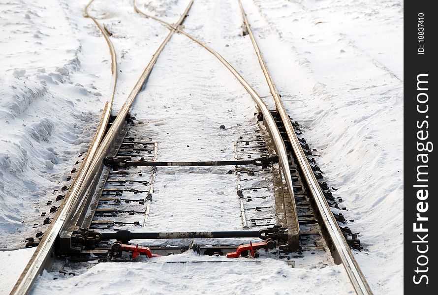 Multiple railroad tracks at a train station. Multiple railroad tracks at a train station