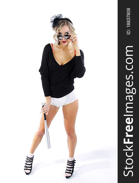 Beautiful girl with a baseball bat