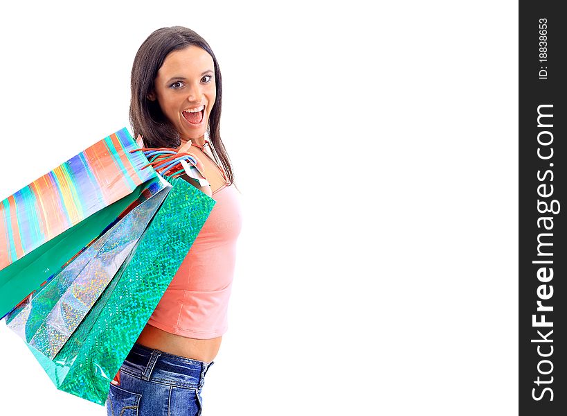 Portrait of an young woman holding several shoppingbag