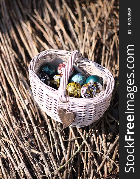 Easter eggs in white basket