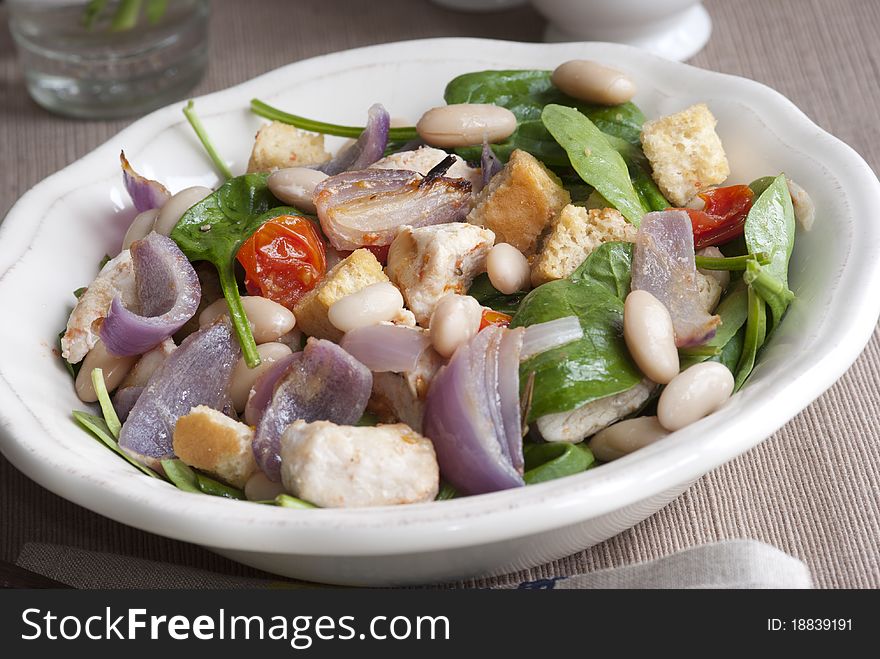 Chicken and bean salad with vegetables and Balsamic dressing. Chicken and bean salad with vegetables and Balsamic dressing