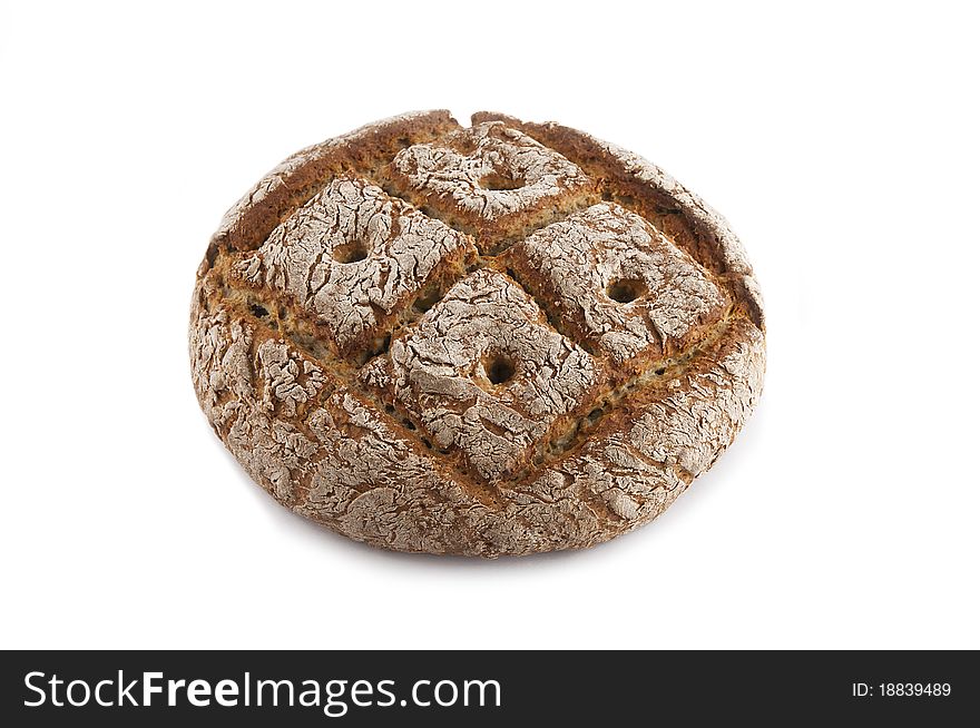 Useful grain wheat bread on a white background