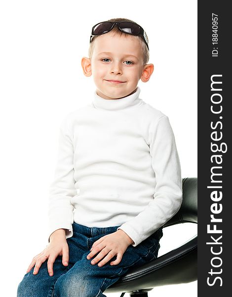 Cute little boy posing isolated on white