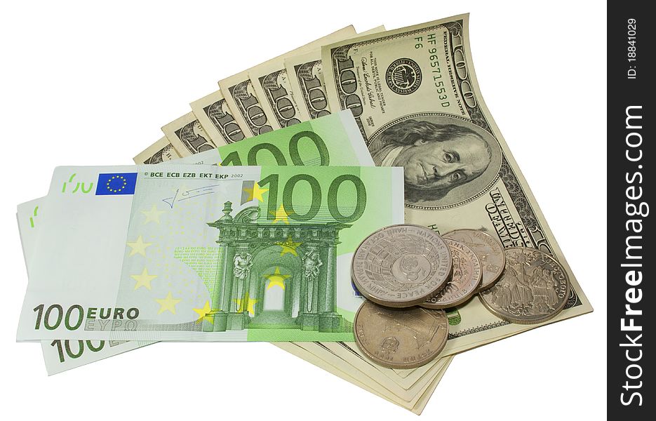Dollars, euros and coins on a white background. Dollars, euros and coins on a white background