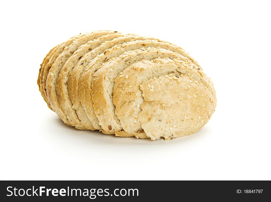 Delicious, fresh, home-made whole wheat bread. Sliced. Isolated. Delicious, fresh, home-made whole wheat bread. Sliced. Isolated