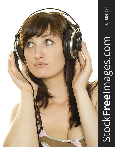 Woman listening to music. Lots of copyspace and room for text on this isolate
