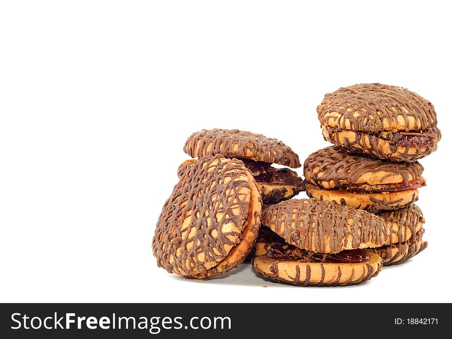 Cookies with milk chocolate , on a white background. Cookies with milk chocolate , on a white background