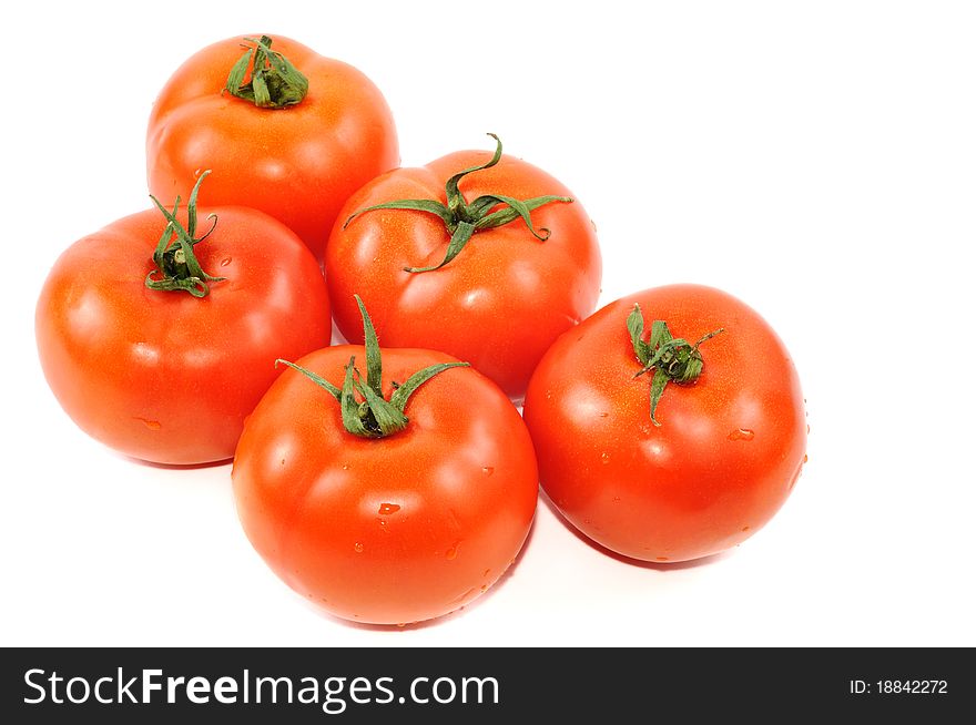 Five red tomato isolated on a white background