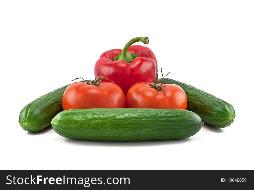 Peppers, tomatoes and cucumbers isolated on white background