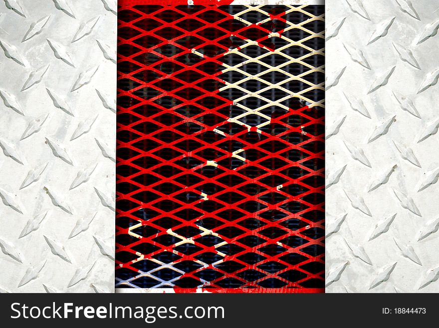 Black and white metallic mesh patterned background. Shallow depth of field. Black and white metallic mesh patterned background. Shallow depth of field