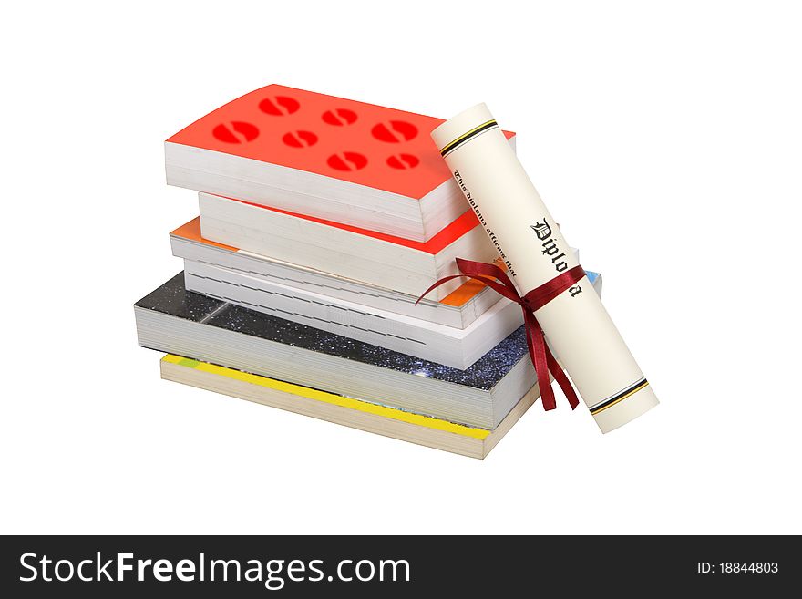 A stack of books and a diploma isiolated on a white background. Clipping path included. A stack of books and a diploma isiolated on a white background. Clipping path included.