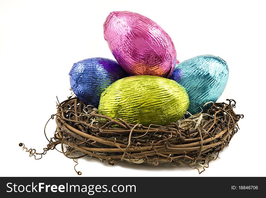 Colorful easter eggs in wooden box on white background. Colorful easter eggs in wooden box on white background