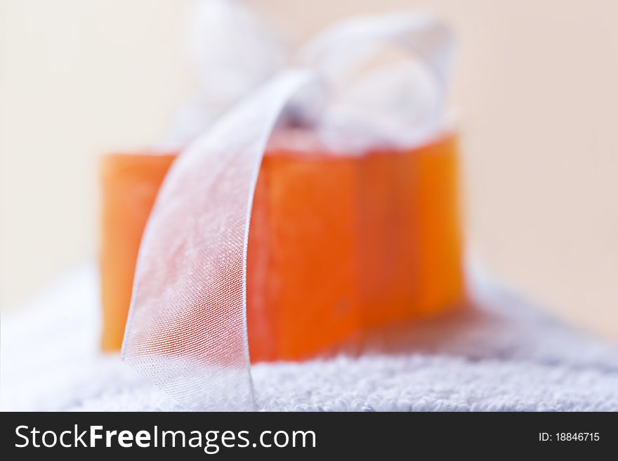Handmade soap and towel in a spa - very shallow depth of field