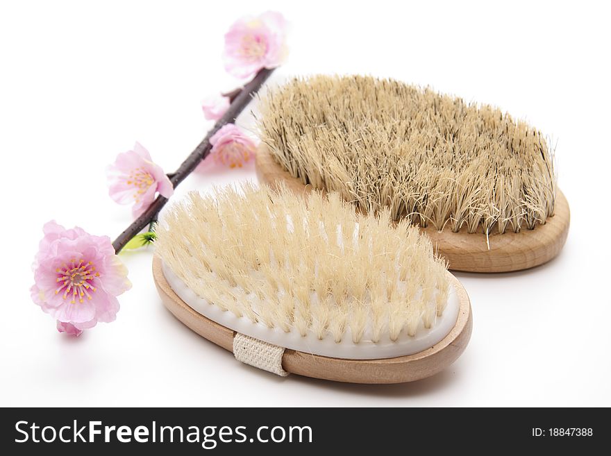 Massage brush with flowering branch