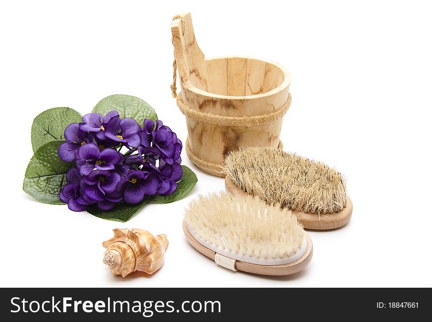 Massage brushes with bristles and bunch of flowers