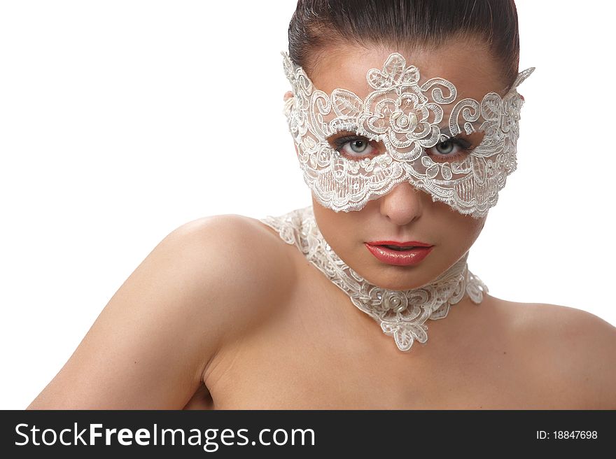 Portrait of attractive woman wearing delicate white lace on her eyes and lace necklace, sitting of elegant position in studio, on white background. Portrait of attractive woman wearing delicate white lace on her eyes and lace necklace, sitting of elegant position in studio, on white background