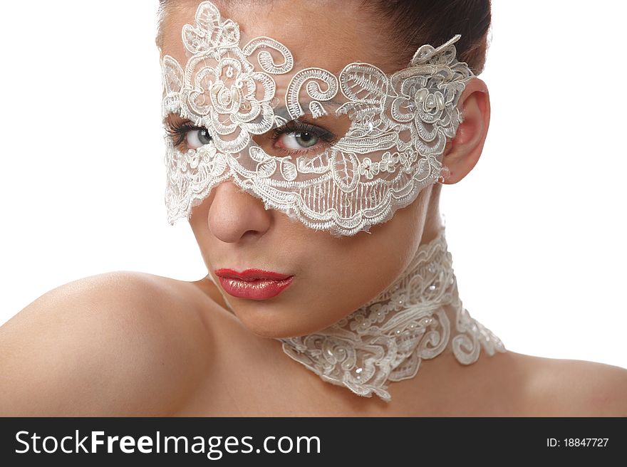 Portrait of attractive woman wearing delicate white lace on her eyes and lace necklace, sitting of elegant position in studio, on white background. Portrait of attractive woman wearing delicate white lace on her eyes and lace necklace, sitting of elegant position in studio, on white background