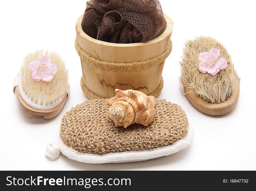 Massage brushes and sponge in the receptacle