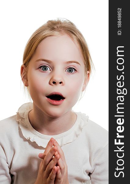 Little girl expressing amazement isolated on white background