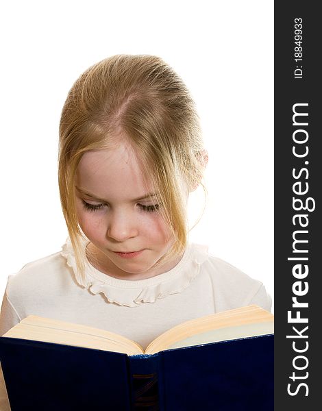 Little girl with open book solated on white background