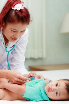 Female Doctor Checking Baby Petient Stock Images Female Doctor Checking Baby Petient Stock Images