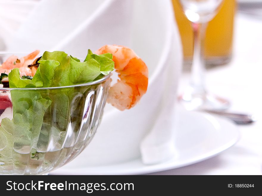 Salad with shrimps close-up
