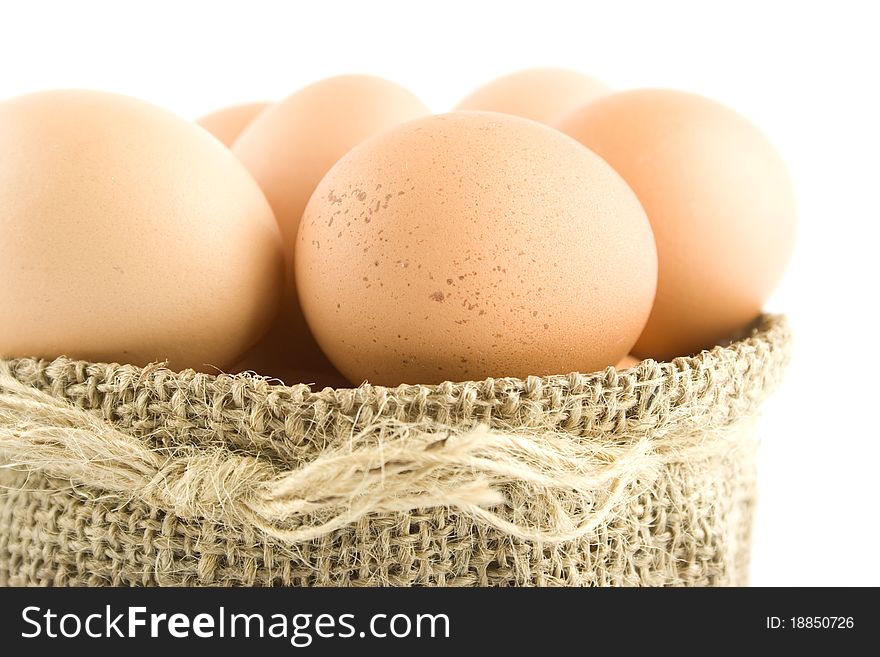 Many eggs are in the bag. Isolated on white background