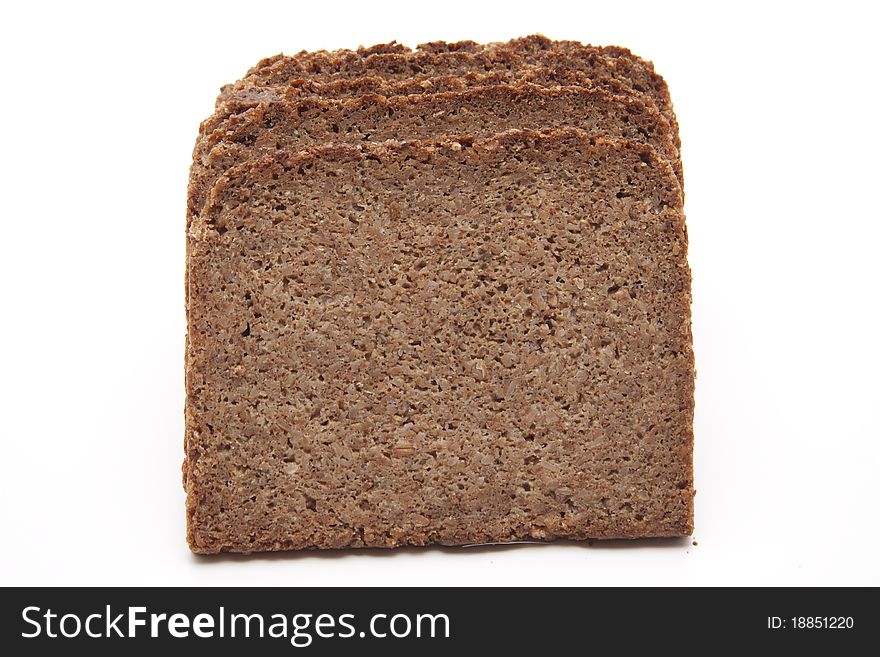 Cut wholemeal bread and onto white background