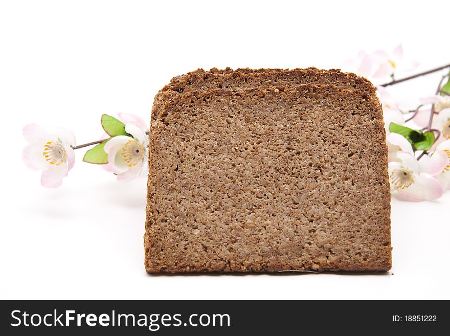 Cut wholemeal bread and onto white background. Cut wholemeal bread and onto white background