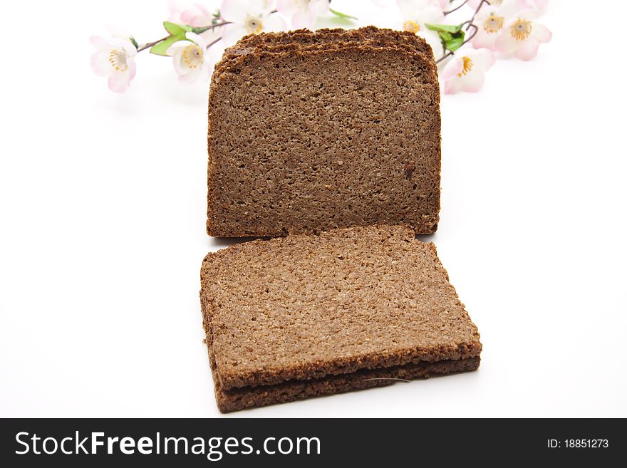 Cut wholemeal bread and onto white background. Cut wholemeal bread and onto white background