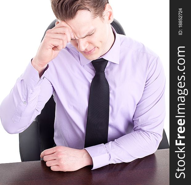 Young businessman with big headache, isolated on white