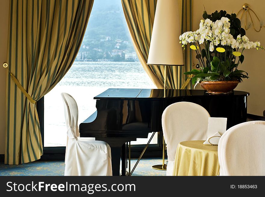 Hotel interior with piano, Italy, lake Como