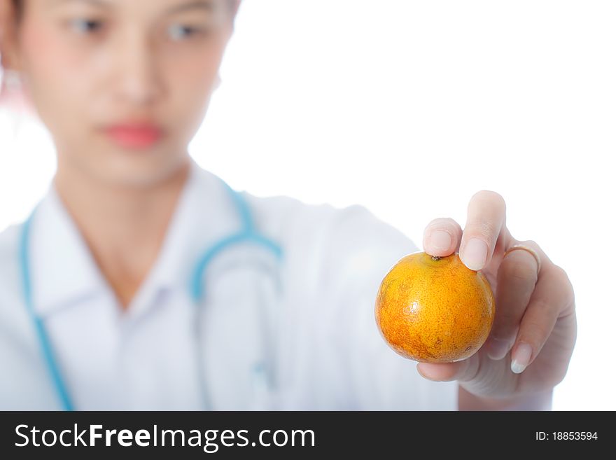 Doctoe holding orange on white background. Doctoe holding orange on white background
