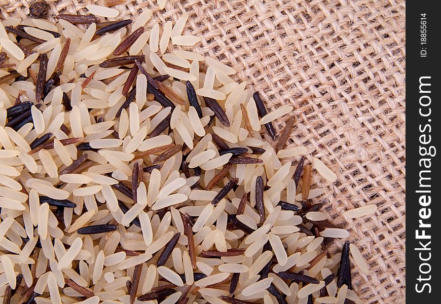 Pile of wild rice on canvas