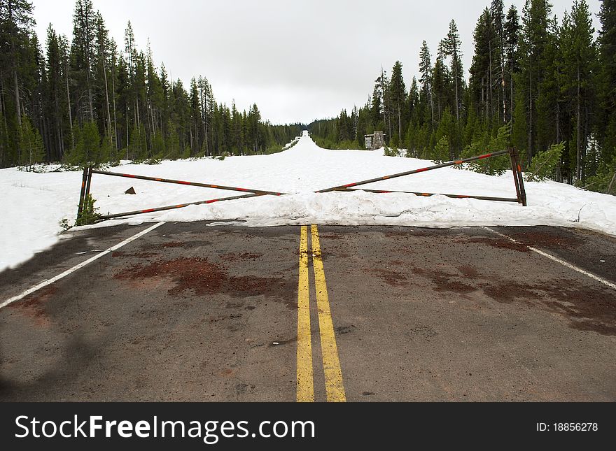 A mountain highway in Oregan is closed do to snow. A mountain highway in Oregan is closed do to snow