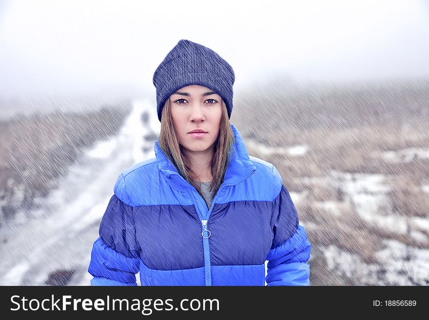 Beautiful girl and snow