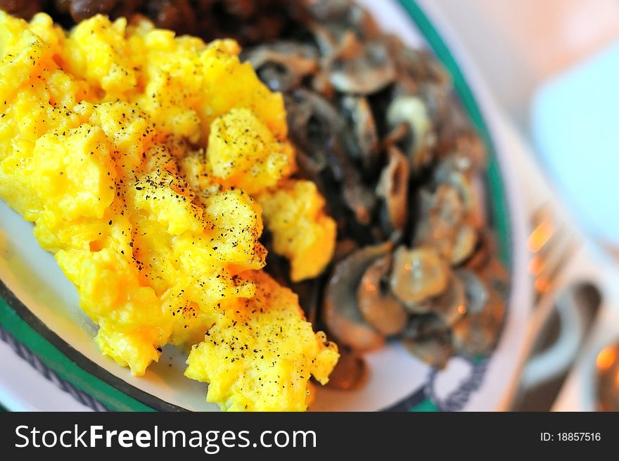 Closeup of Western meal of scrambled egg and mushroom. Closeup of Western meal of scrambled egg and mushroom.