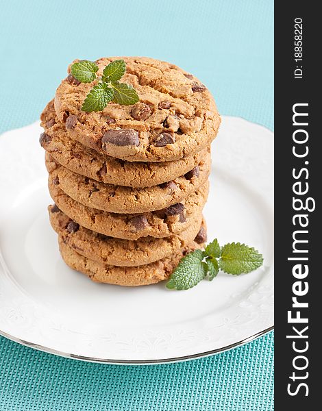 Chocolate chip cookies on white plate