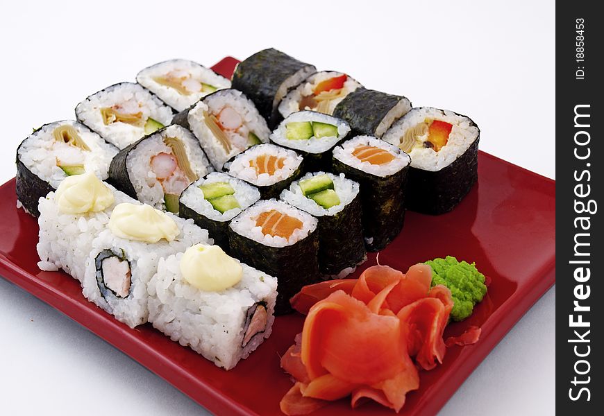 Photo of a rolled and sushi on plate