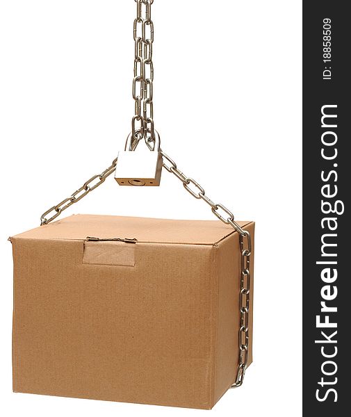 Cardboard box closed with a chain and a lock on a white background