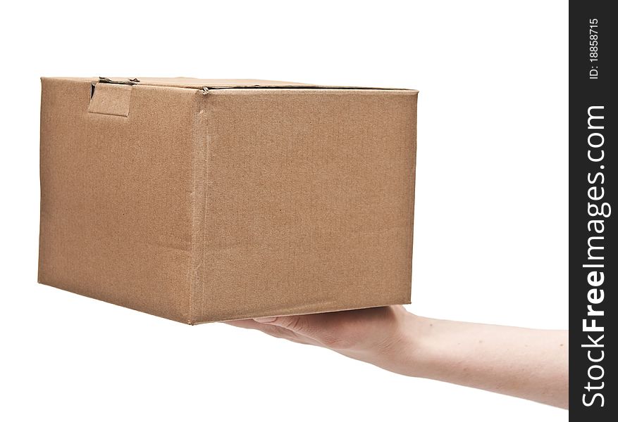 Man's hand with cardboard box on white background