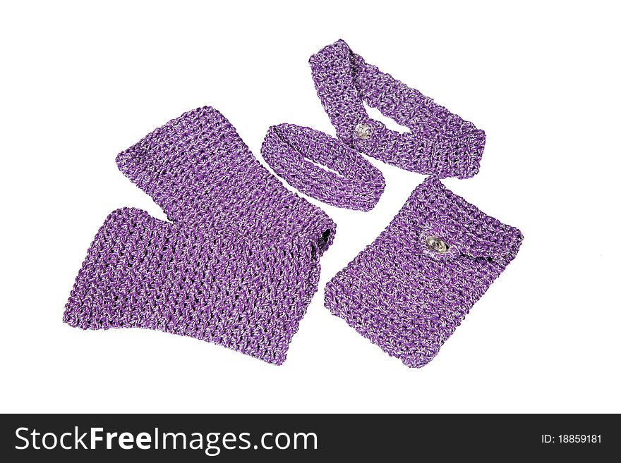 A set of knitted accessories isolated on white with clipping path. A set of knitted accessories isolated on white with clipping path