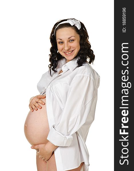 Woman expecting baby. Isolated on white