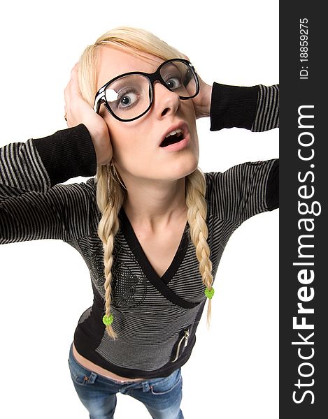 Smart young blond woman with funny glasses and plait looks like nerdy girl. Pose and looking at camera, humor style on white background. Smart young blond woman with funny glasses and plait looks like nerdy girl. Pose and looking at camera, humor style on white background.