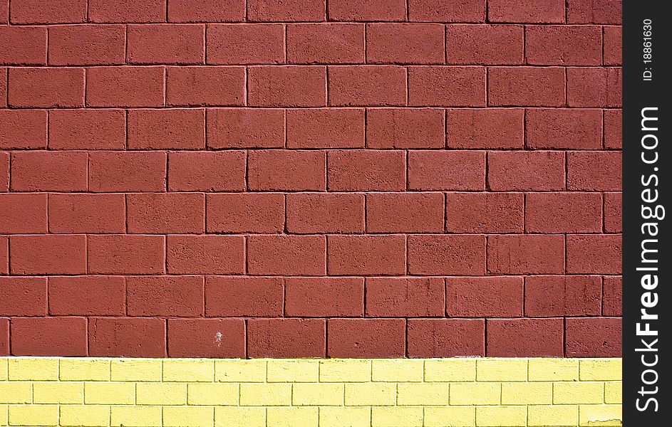 Texture brick wall. Brown top and yellow bottom