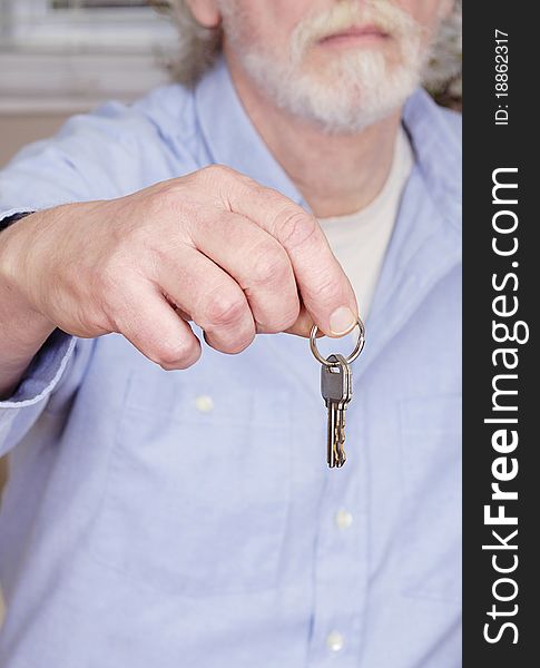 Man Holding Keys