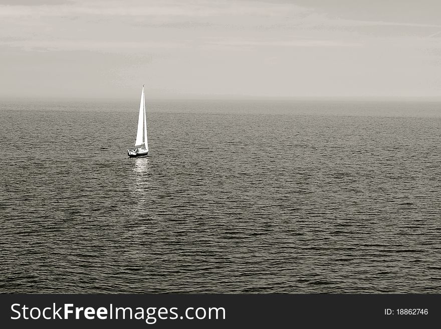 Sailing ship alone on the ocean. Sailing ship alone on the ocean