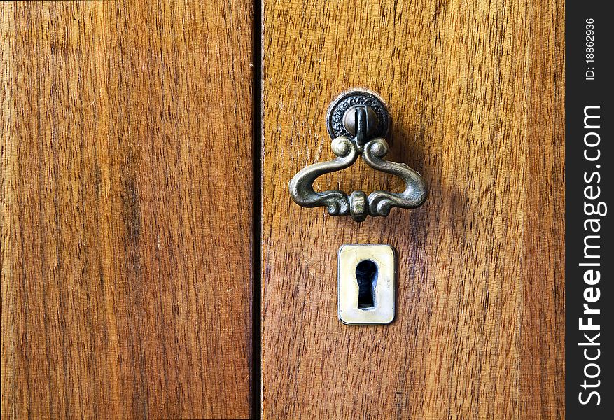 Furniture keyhole, wooden door with handle