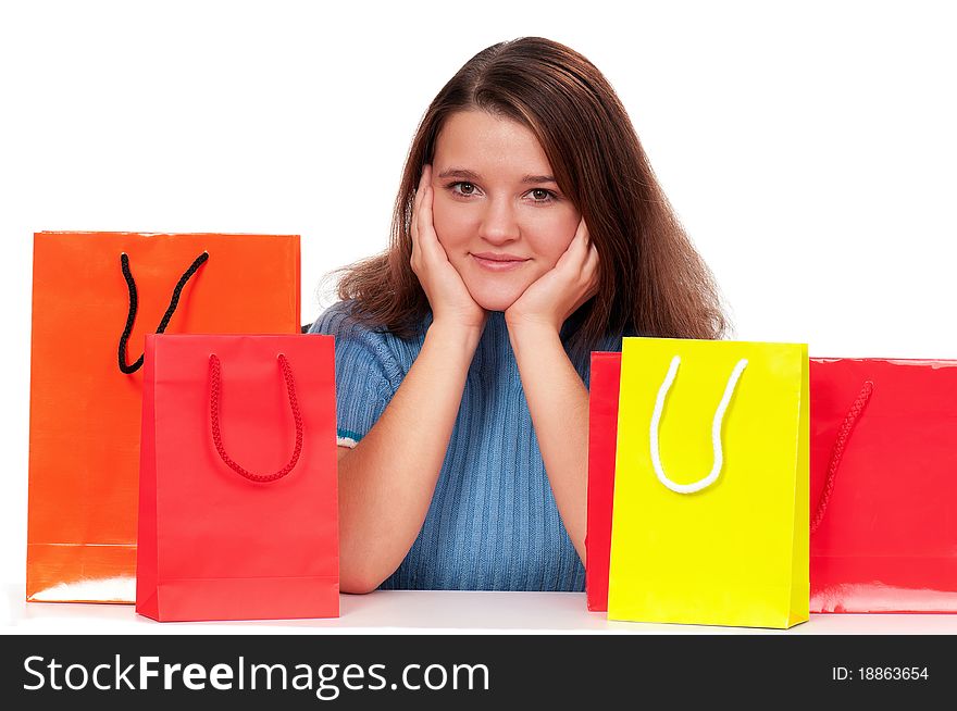Portrait of beautiful girl with shopping bags
