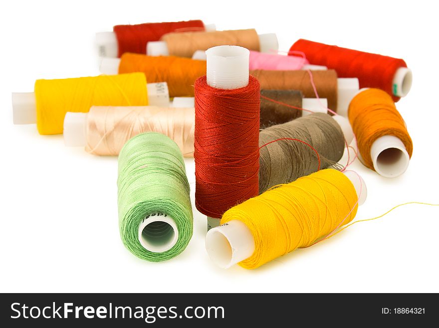 Group of spool of thread in various colors